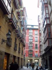 Street view of Casco Viejo in Bilbao, Spain with historic buildings and traditional architecture