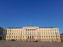 A panoramic view of Helsinki cityscape with modern and historical buildings under a clear blue sky