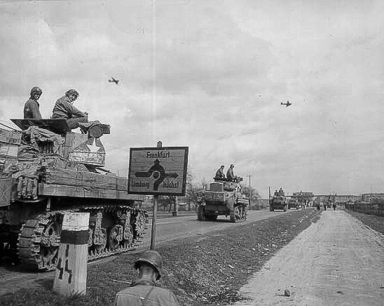Tanks of the 11th Armored Division advancing on the autobahn near Frankfurt Germany March 31 1945