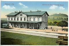 Stolpen train station in 1913 with historic buildings and railway tracks