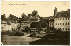 Historic image of Stolpen Markt square with traditional buildings and crowded streets in 1920