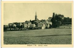 Historic Schloss and church in Stolpen with surrounding greenery
