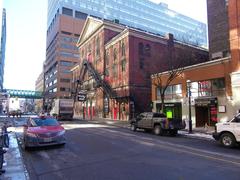 Massey Hall building illuminated by reflections from nearby windows at night