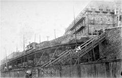 Historic 1898 railway viaduct connecting Lower Town to Upper Town in Quebec with Aiguillon Pavilion of Hôtel-Dieu in background