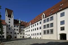 Interior courtyard facade of Alter Hof buildings numbers 3 and 2 with new gate tower in Munich