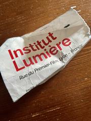 Crumpled ticket from Institut Lumière December 2023