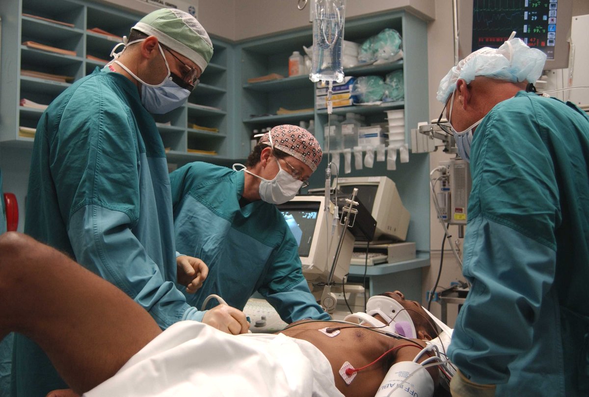 U.S. Army forward surgical team providing advanced medical care to injured combatants and civilians on the front lines in Iraq