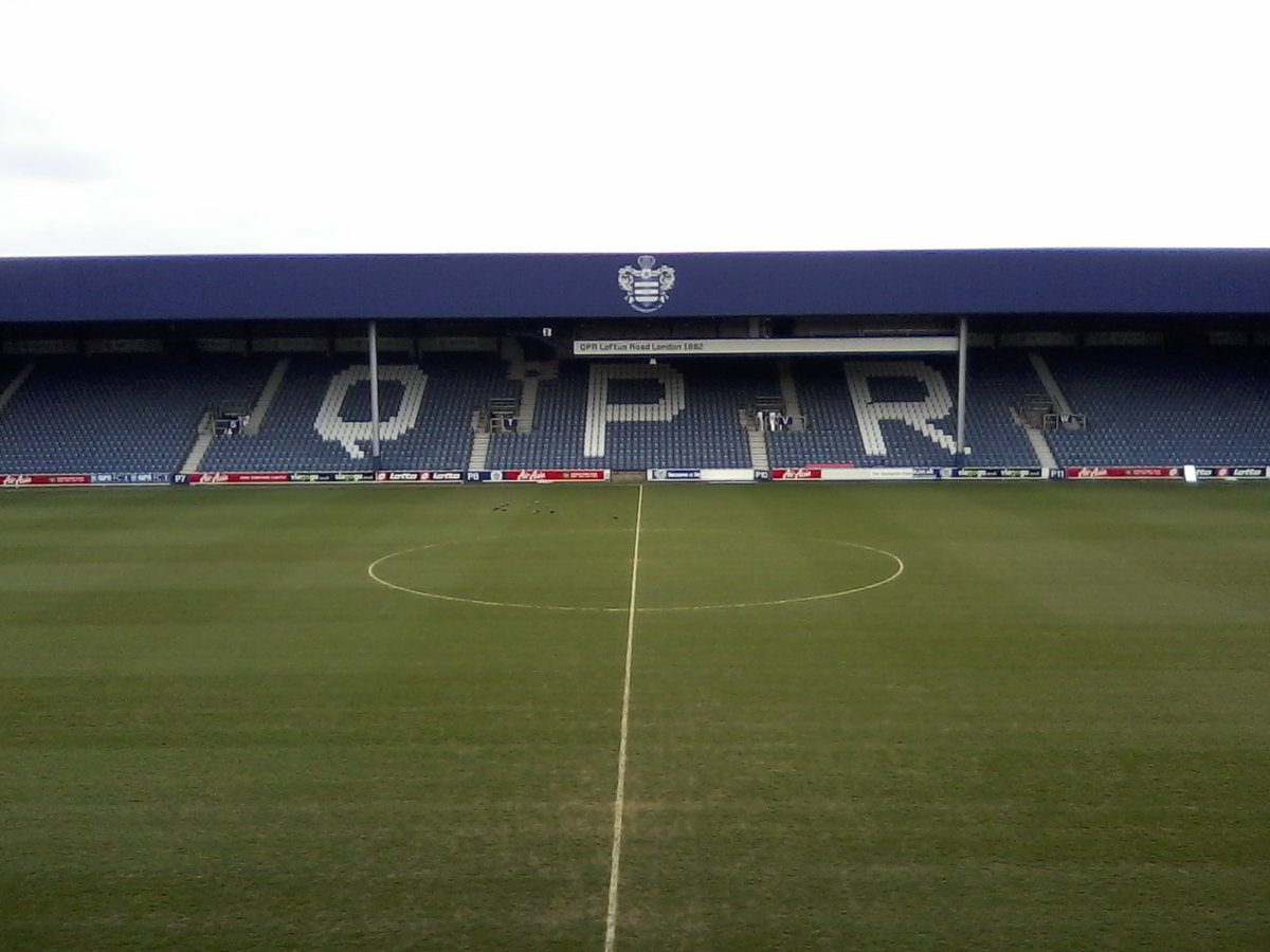Ellerslie Road Stand at Loftus Road football stadium, filled with spectators during a match