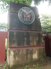 Intersection of Radial Road 6 and C. P. Garcia Avenue near University Avenue in Quezon City with City Mall and U.P. Campus footbridge