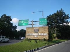 Aerial view of San Vicente area in Barangays of Quezon City featuring Old Capitol Site, City Mall, PhilCoa footbridge, and nearby U.P. Village in Quezon City District 4