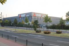 Mitsubishi Electric Halle building in Düsseldorf under clear sky