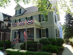 John F. Kennedy birthplace decorated with red white and blue birthday banners