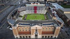 Aerial view of Jones AT&T Stadium surrounded by a cityscape