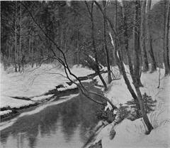 Winter landscape with a flowing stream