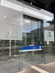 Main entrance of Melbourne Law School with modern architectural design