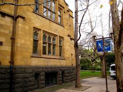 Classic Old Arts Building at University of Melbourne with sandstone facade and arched windows
