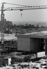 Construction site of Tel Aviv University complex with cranes and building structures