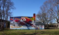 Street view of Kalkumer Straße 85 with mural featuring DEG and ISS Dome in Düsseldorf 2019