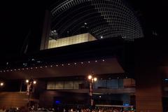 Kimmel Center for the Performing Arts illuminated exterior at night across Broad Street