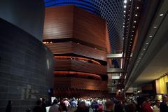 Interior view of the Kimmel Center for the Performing Arts at night with illuminated architectural features