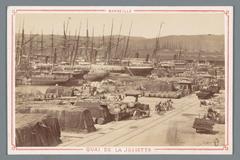 Historic photograph of a quay in Marseille showing ships docked along the Quai de la Joliette between 1870 and 1900