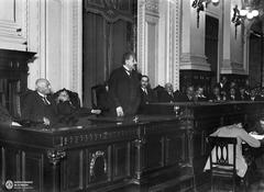 Albert Einstein standing in the Aula Magna of Colegio Nacional de Buenos Aires with José Arce and Ángel Gallardo, 1925