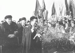 Norodom Sihanouk and Zhou Enlai warmly welcoming at Beijing Capital Airport in 1956
