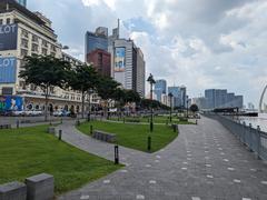 Bach Dang Quay in District 1, Saigon with boats docked along the riverside and cityscape in the background