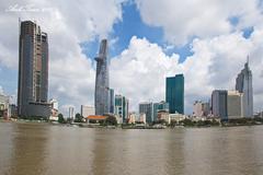 Ho Chi Minh City skyline along the river at sunset