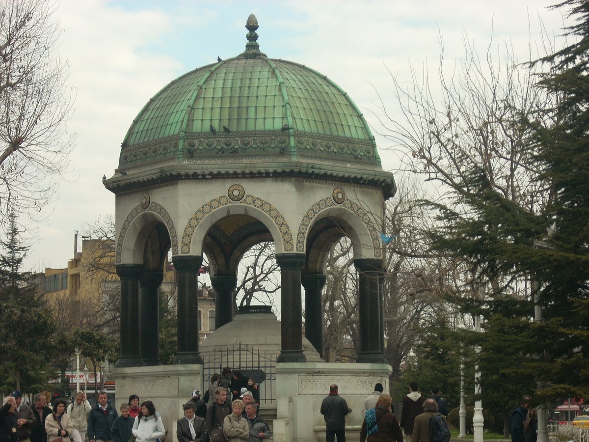 German Fountain in Istanbul with ornate golden ceiling and stone arches