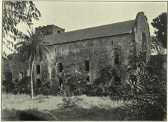 Photograph from the Annual Report of the Archaeological Survey of India 1913-14 showing archaeological structures and excavation site