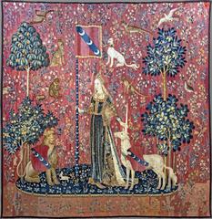 Medieval tapestry showing a lady with a unicorn at Cluny Museum Paris