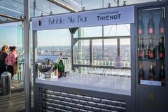 Bar interior on Tour Montparnasse with modern decor and panoramic city views