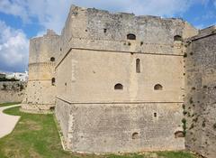 Castle of Otranto in Italy on a hill with stone walls and towers