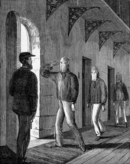 Prisoners of Pentridge Prison wearing hoods under the Silent System