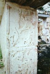 Detailed carved column at Kabah archaeological site