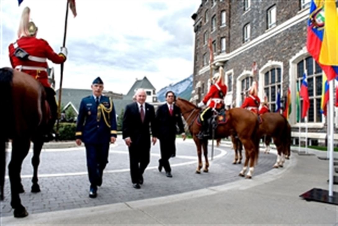 Defense Secretary Robert M. Gates walking with Canadian Maj. Gen. Langpon in Banff Canada 2008