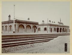 Beijing Xizhimen Railway Station on Jingzhang Railway with sign and guards in front