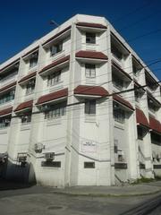 Historic Intramuros district with notable landmarks and the Filipino Seafarer sculpture in Manila