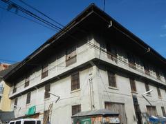 Intramuros landmarks in Manila including the Associated Marine Officers and Seamen's Union of the Philippines - AMOSUP building and The Filipino Seafarer sculpture