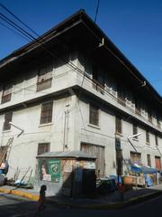 Intramuros landmarks in Manila featuring historical streets and sculptures including the Filipino Seafarer
