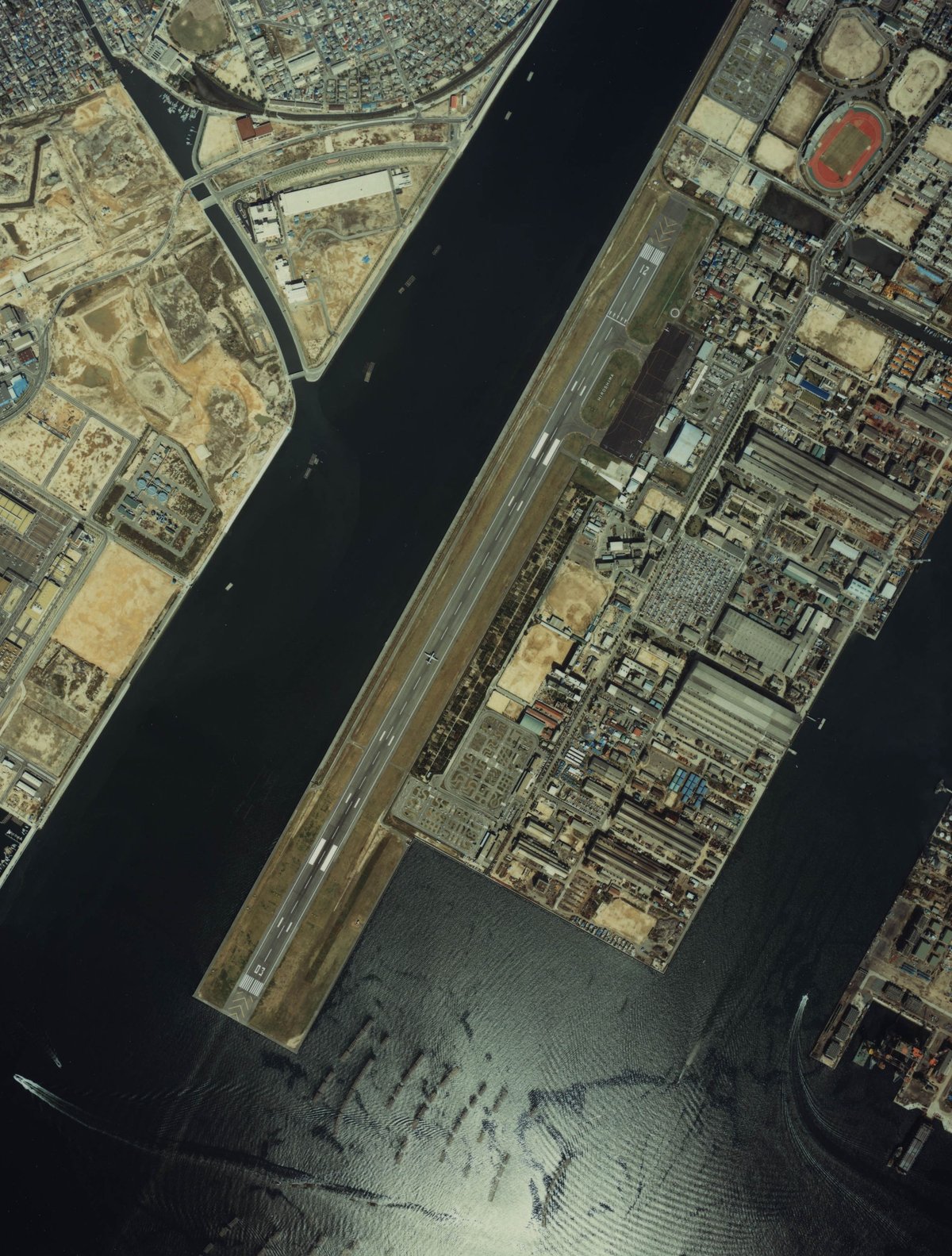 Aerial view of Hiroshima-Nishi Airport in Hiroshima, Japan in 1981