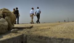 Indian Air Force Anil Sabharwal giving Deputy Secretary of Defense Ashton B Carter a tour of new runway at Hindan Air Force Station Delhi India Sep 18 2013
