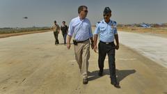 Anil Sabharwal giving Deputy Secretary of Defense Ashton B. Carter a tour of new runway at Hindan Air Force Station India 2013