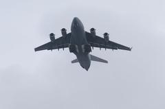 U.S. Air Force C-17 landing with AH-64 Apache helicopters at Wiesbaden Army Airfield