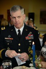 Lt. Gen. Donald Campbell Jr. engaged with guests at Multi National 2013 New Year's reception on Clay Kaserne in Wiesbaden, Germany