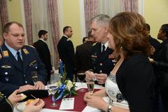 Lt. Gen. Donald Campbell Jr. and wife speaking with guests at 2013 Multi National New Year's reception in Wiesbaden Germany