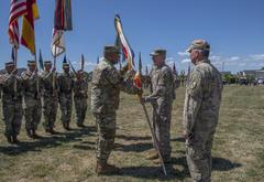 General Darryl Williams receiving command colors from General Tod D. Wolters at USAREUR-AF Change of Command Ceremony in Wiesbaden, Germany