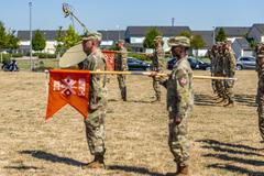 U.S. Soldiers of 102d Signal Battalion rendering honors during change of command ceremony at Clay Kaserne Wiesbaden Germany June 2022