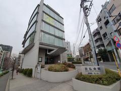 Maison Franco-Japonaise building entrance with modern architectural design and signage